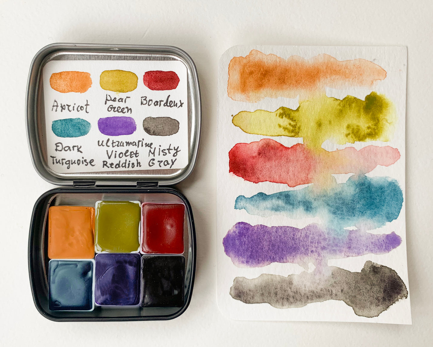 Handmade artisanal watercolor paint mini palette.