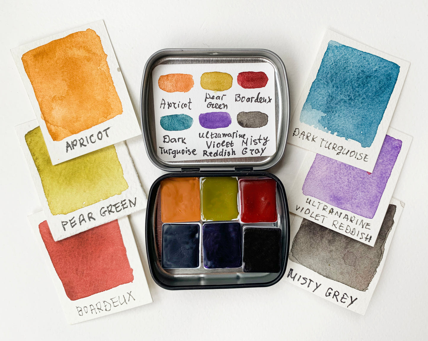Handmade artisanal watercolor paint mini palette.