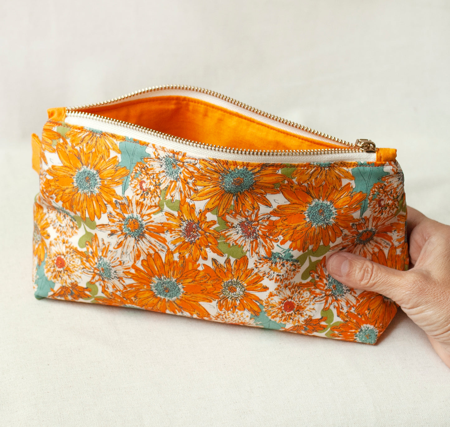 Orange daisy makeup bag – artisan floral cosmetic pouch