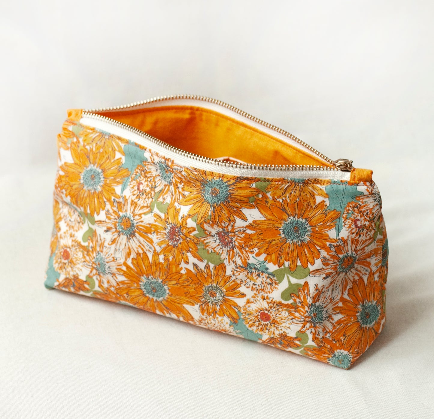 Orange daisy makeup bag – artisan floral cosmetic pouch
