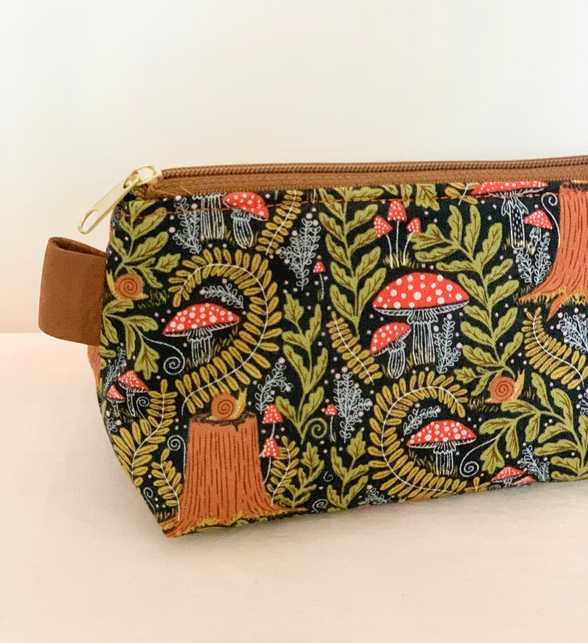 Artist supply brush case with forest fabric print