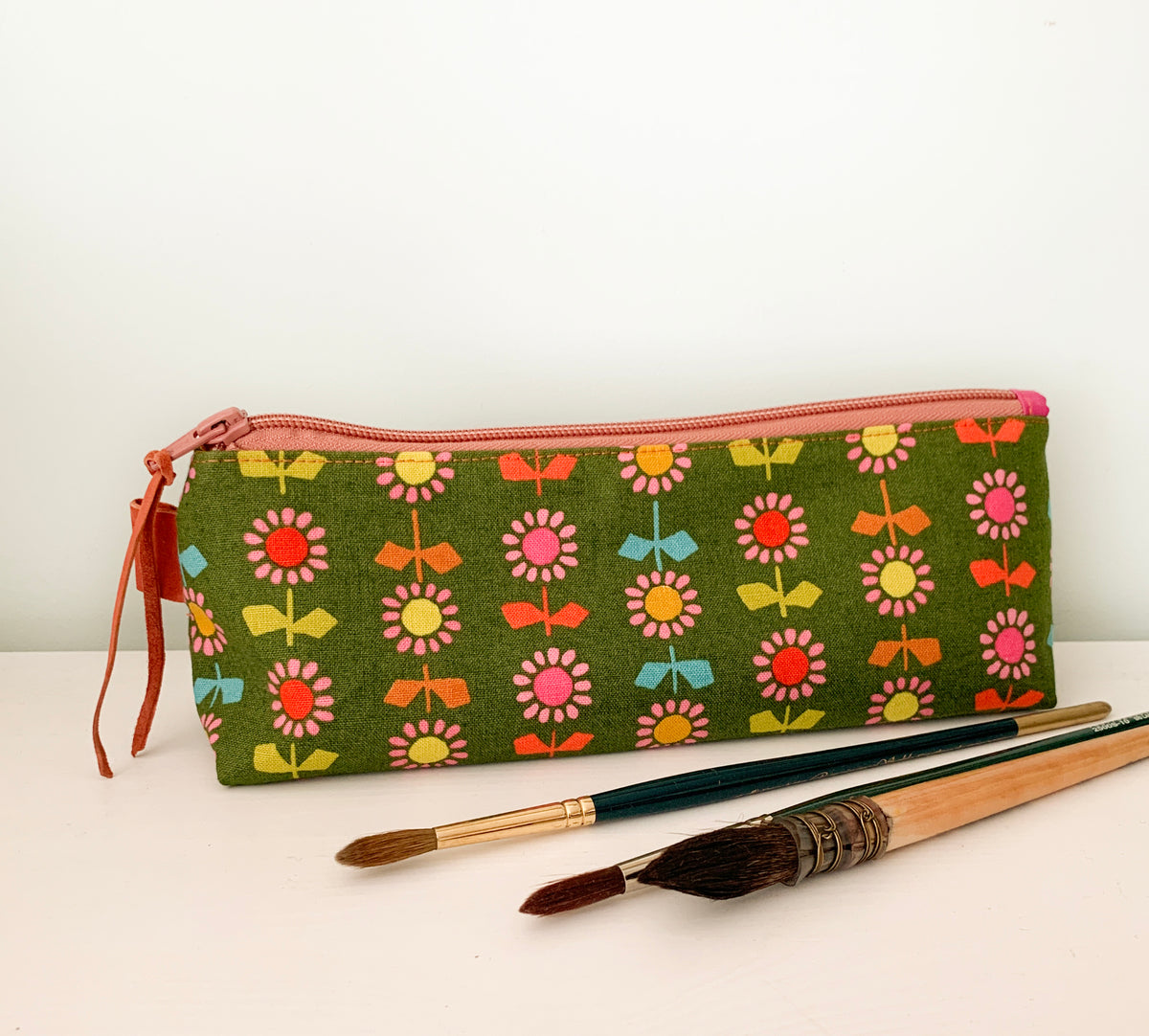 Artist supply brush case with modern floral print