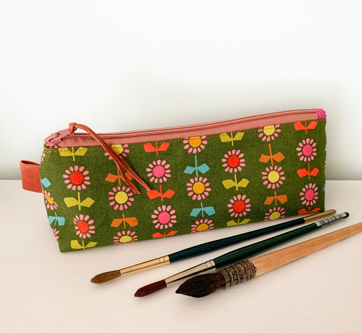 Artist supply brush case with modern floral print