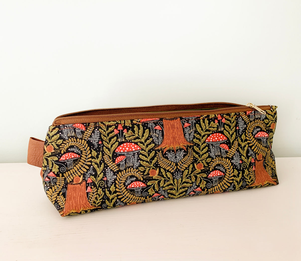 Artist supply brush case with forest fabric print