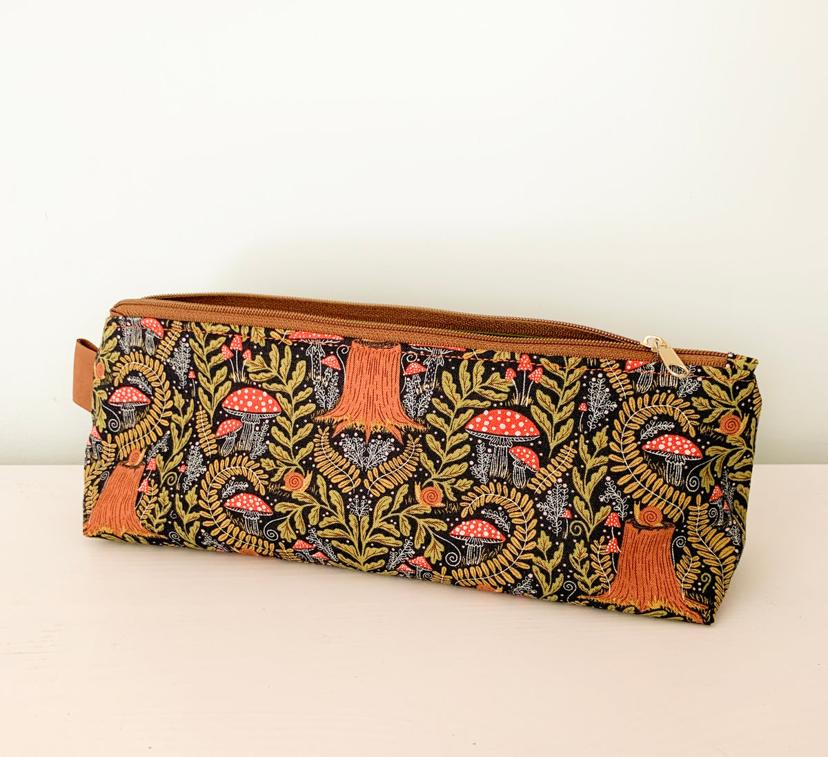 Artist supply brush case with forest fabric print