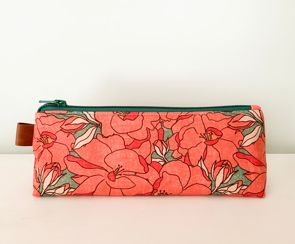 Artist supply brush case with red floral print