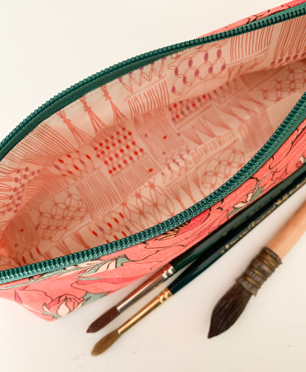Artist supply brush case with red floral print
