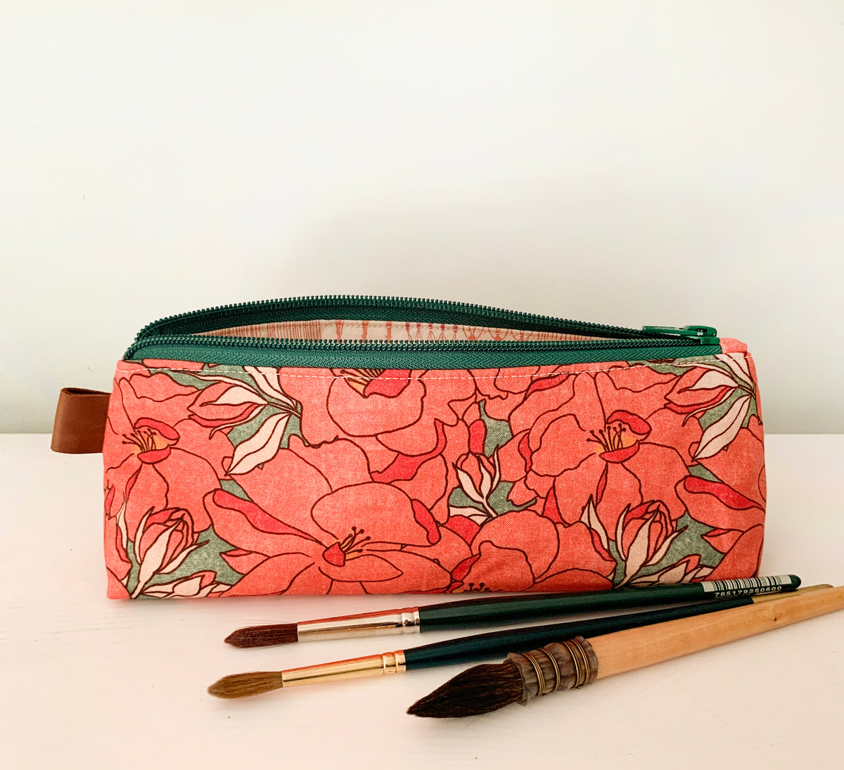 Artist supply brush case with red floral print