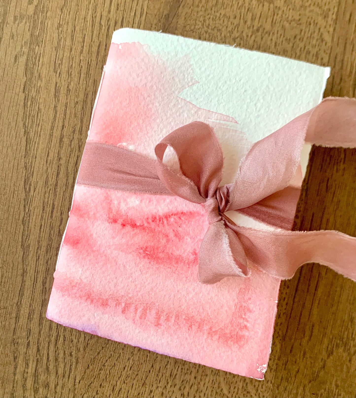 Pink watercolor journal.